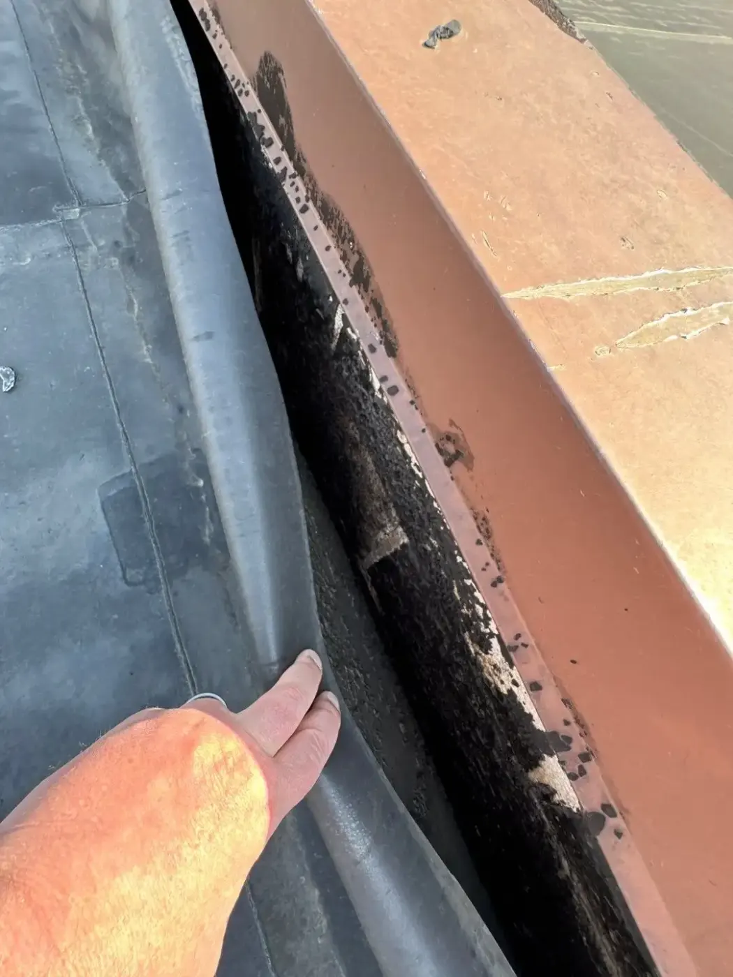 Tarping and dry-in on a Jamestown commercial roof
